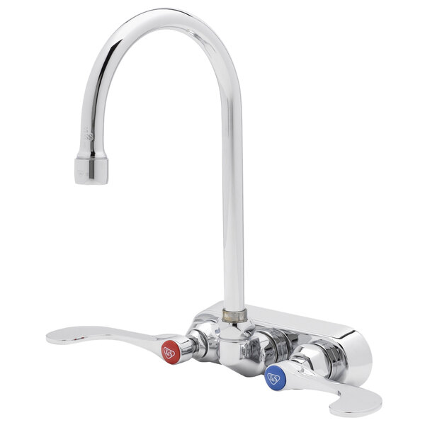 A T&S chrome wall mount faucet with two gooseneck spouts and blue wrist handles.