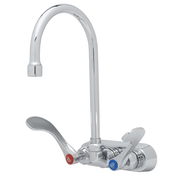 A T&S chrome wall mounted faucet with a gooseneck spout and wrist handles.