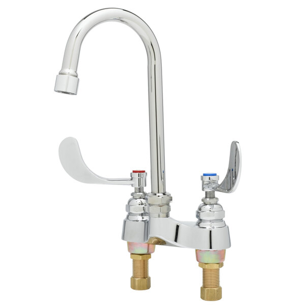 A T&S chrome deck mounted medical faucet with 4" wrist handles.