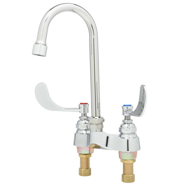 A T&S chrome medical faucet with 2 white wrist handles.