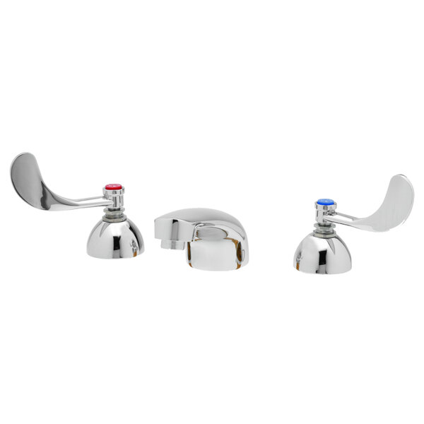 Two T&S deck mounted lavatory faucets with white wrist handles and chrome faucets.