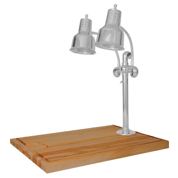 A stainless steel Hanson Heat Lamps carving station with a maple base holding two heat lamps.