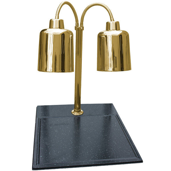 A Hanson Heat Lamps brass carving station with black granite base holding two brass lamps.
