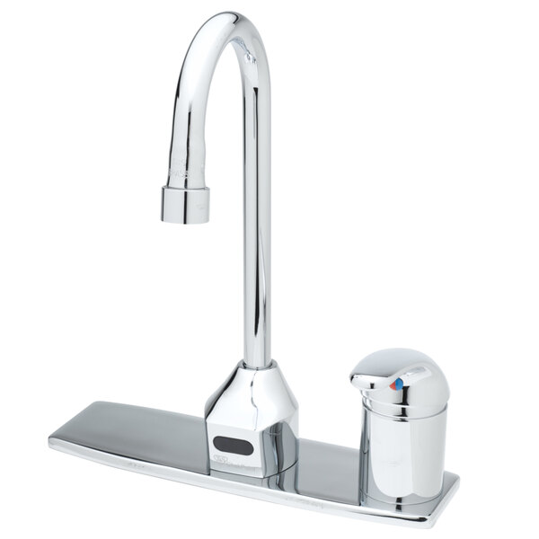 A T&S chrome hands-free faucet with a gooseneck spout above a chrome deck plate.