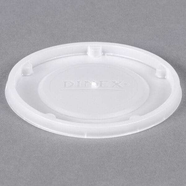 A Dinex translucent plastic lid for a tumbler.