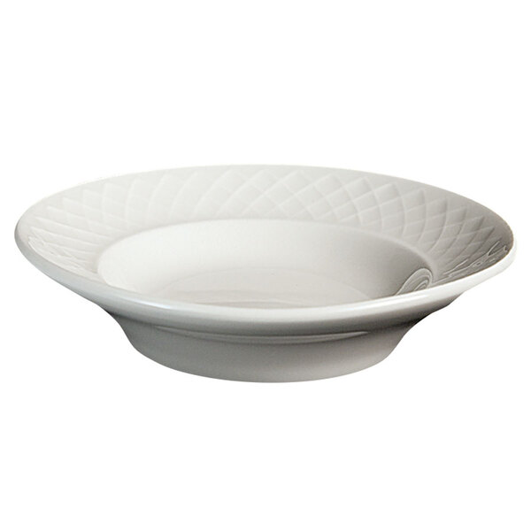 A Homer Laughlin bright white china bowl with a quilted pattern on the edge.