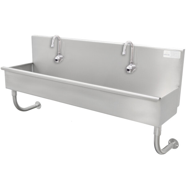 An Advance Tabco stainless steel multi-station hand sink with an electronic faucet.