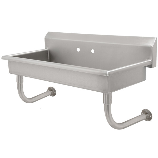 A stainless steel Advance Tabco multi-station hand sink with two hooks on the side.