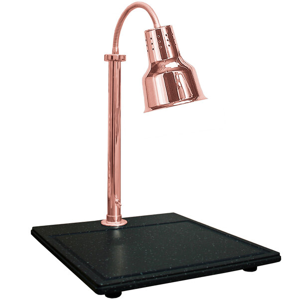 A Hanson Heat Lamps copper lamp on a black synthetic granite surface.