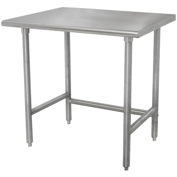 An Advance Tabco stainless steel work table with galvanized legs and a square top.