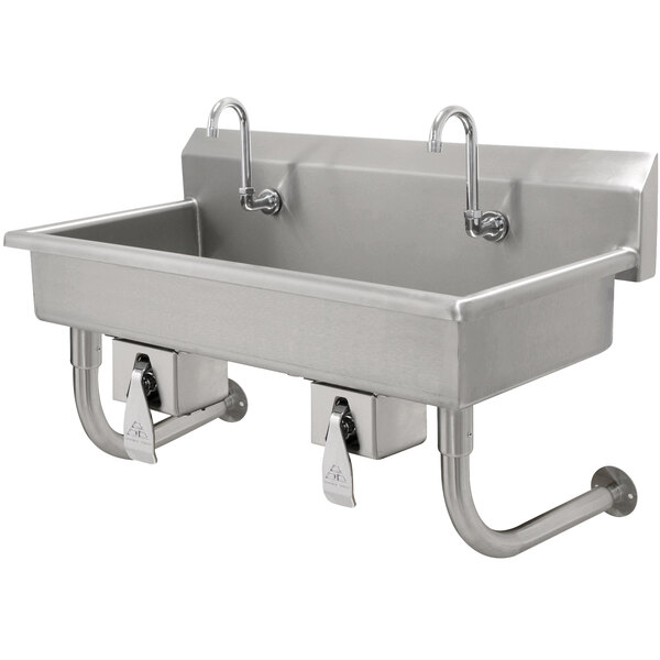 An Advance Tabco stainless steel multi-station hand sink with knee operated faucets.