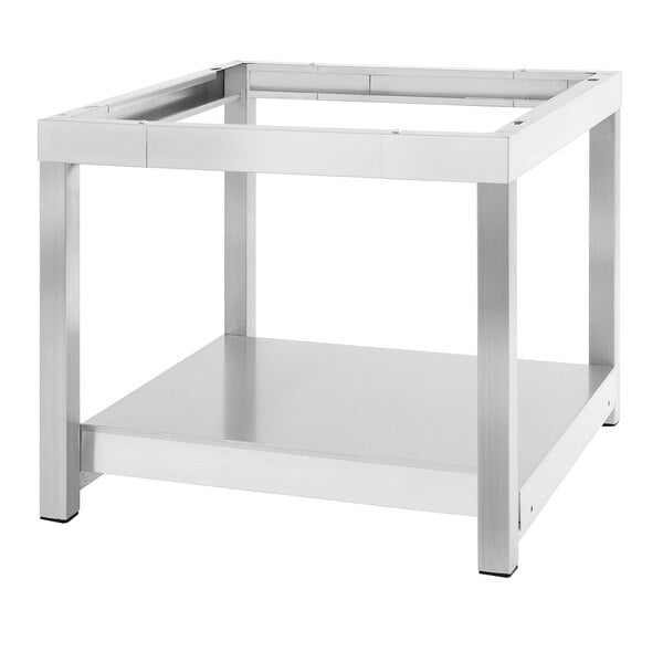 A Garland stainless steel equipment stand with a shelf on top.
