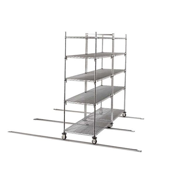 A stainless steel Metro qwikTRAK shelving unit with wheels that holds four shelves.