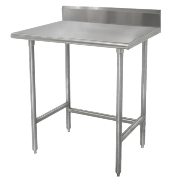 An Advance Tabco stainless steel work table with a 5" backsplash on galvanized legs.