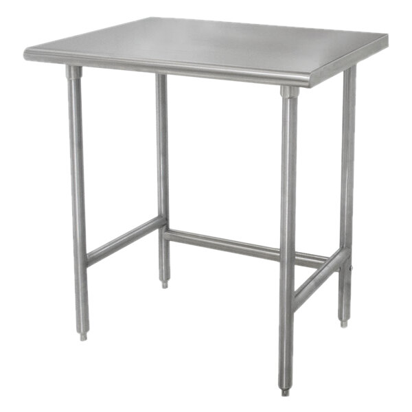 An Advance Tabco stainless steel work table with a rectangular top and open base.