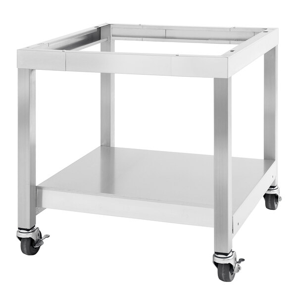 A metal table with wheels and a stainless steel cart.