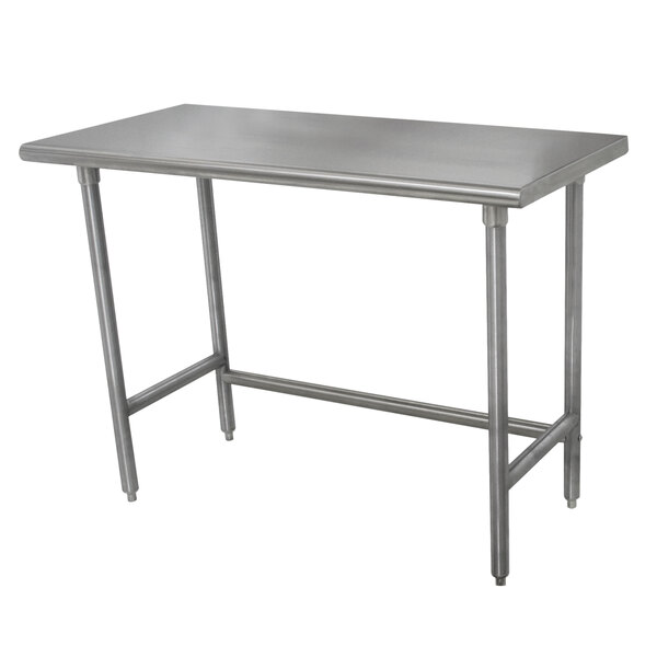 An Advance Tabco stainless steel work table with rectangular top and legs.