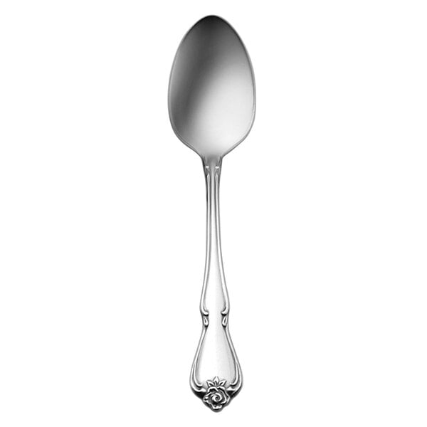 A Oneida Arbor Rose stainless steel teaspoon with a handle.