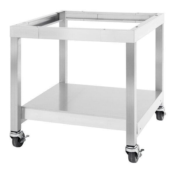 A stainless steel metal cart with wheels.