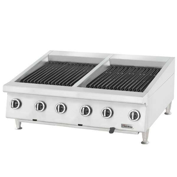 A U.S. Range natural gas charbroiler with adjustable grates over ceramic briquettes.