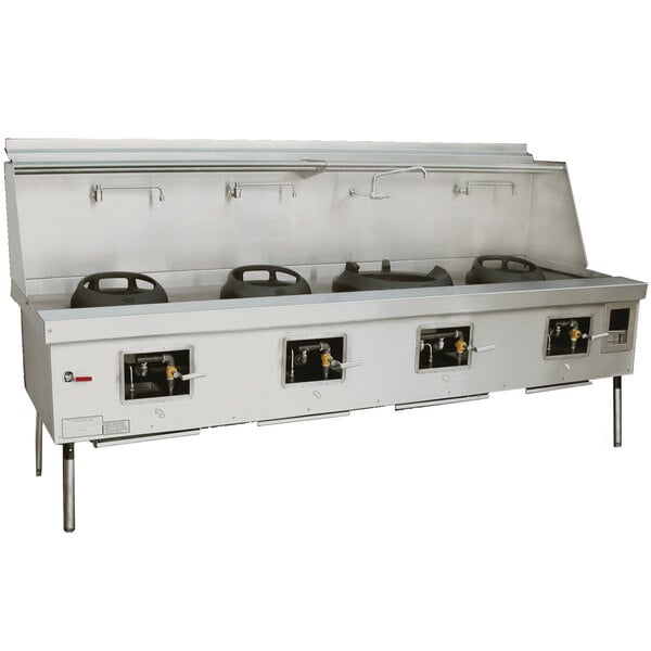A Town York natural gas wok range with four chambers on a counter.