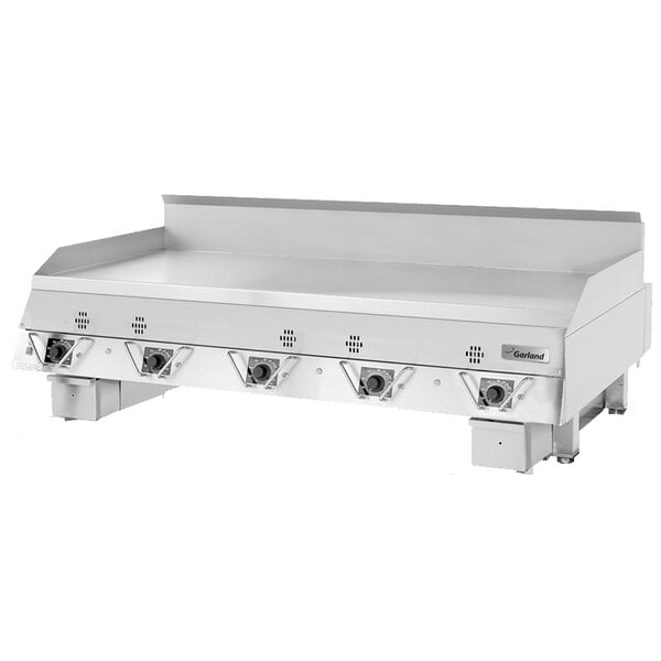 A Garland Master Series natural gas griddle with thermostatic controls and four burners.