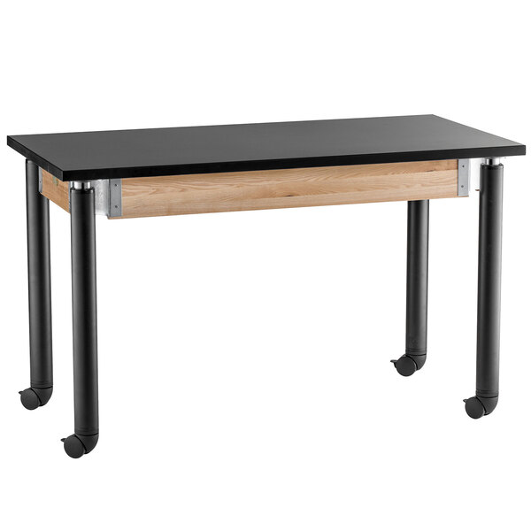 A black and wood National Public Seating science lab table with wheels.