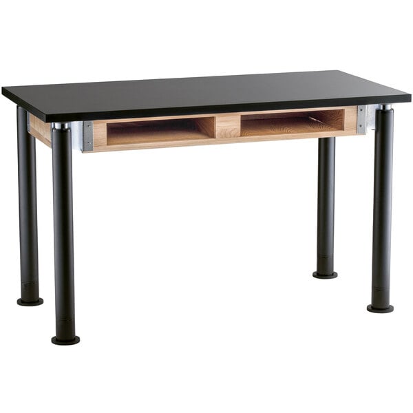 A black National Public Seating science lab table with black legs.