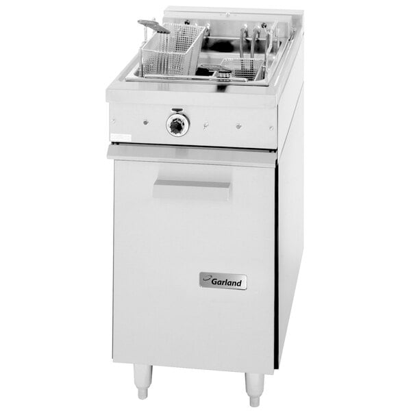 A white commercial electric floor fryer.