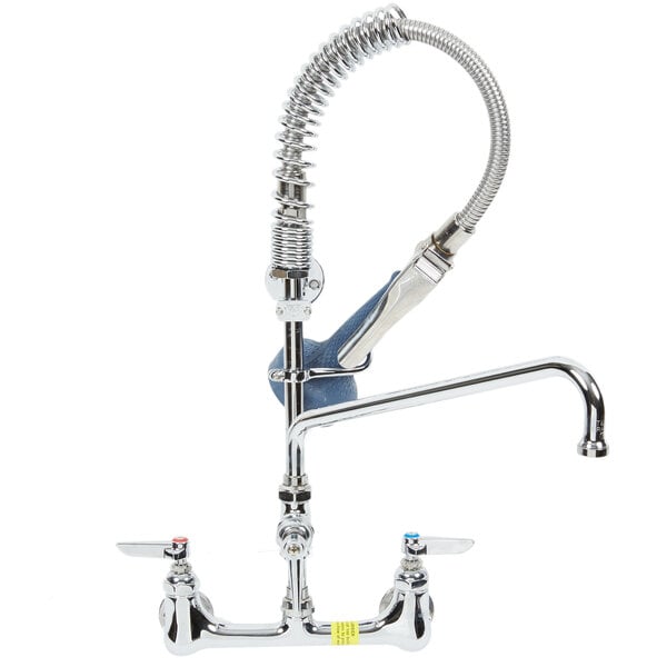 A T&S chrome low profile wall mounted pre-rinse faucet with a hose.