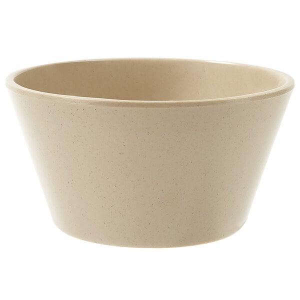 A beige GET Tahoe Sandstone bowl with a speckled surface.