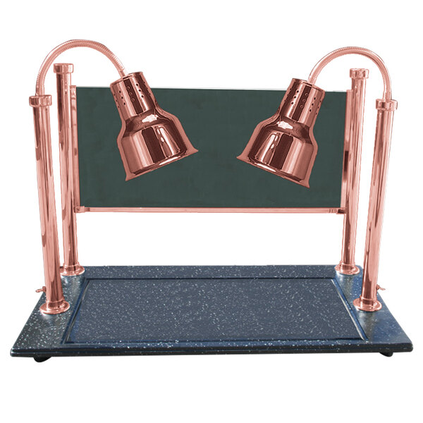 A Hanson bright copper carving station with two lamps on a black surface.