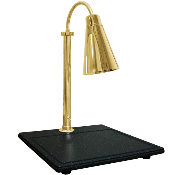 A brass Hanson Heat Lamp with a brass shade on a black synthetic granite base.