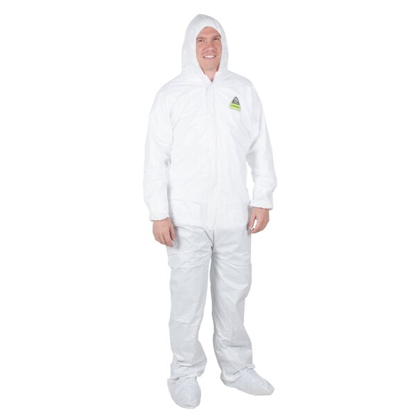 A man wearing a Cordova white disposable protective suit with a hood.
