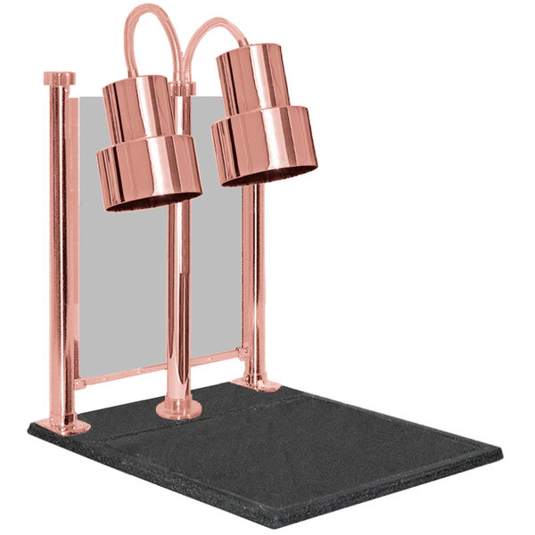 A Hanson Heat Lamps bright copper carving station with black posts holding copper lamps.