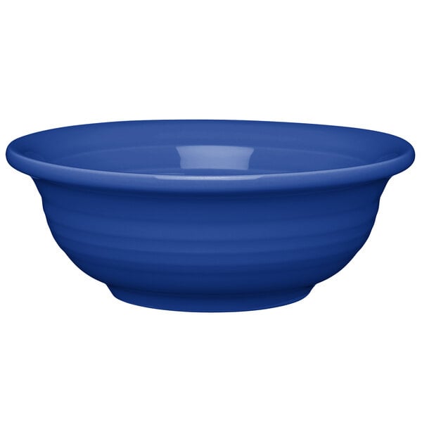 A white china bowl with a blue rim.