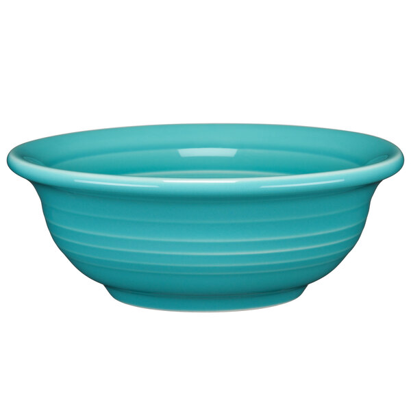 A close-up of a turquoise Fiesta china bowl.