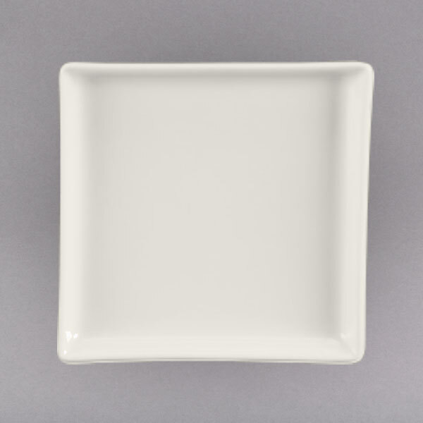 A white square china tray with a small rim.