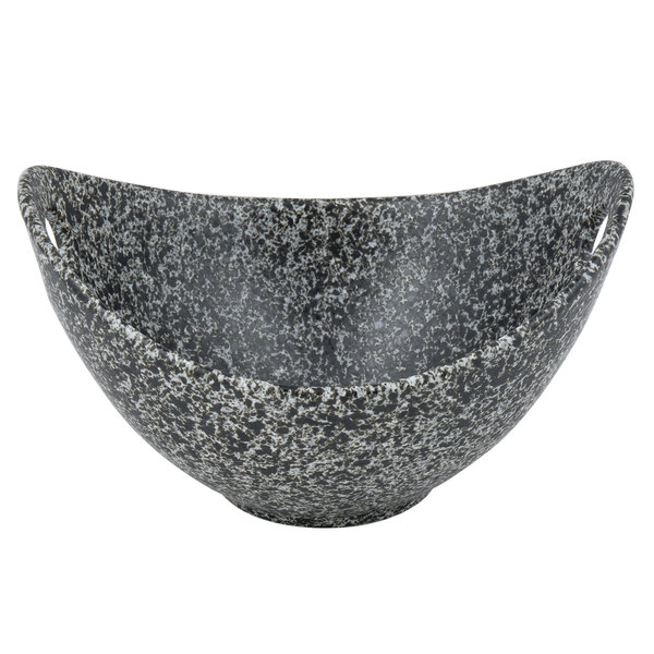 A black and grey speckled 10 Strawberry Street granite porcelain bowl with cut-out handles.