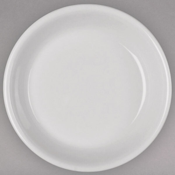 A white Homer Laughlin China coupe plate with a white rim.