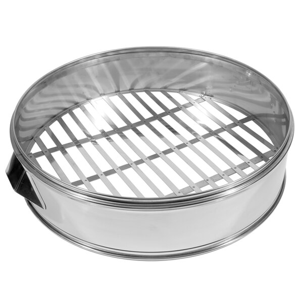 A Town stainless steel steamer with a round metal grill and a handle.