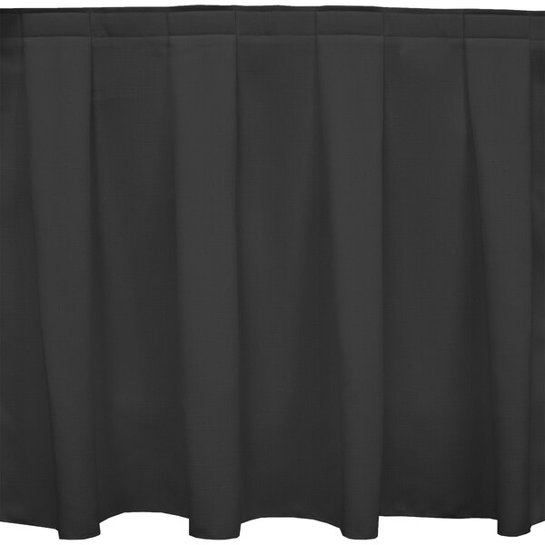 A black box pleat table skirt with velcro clips.