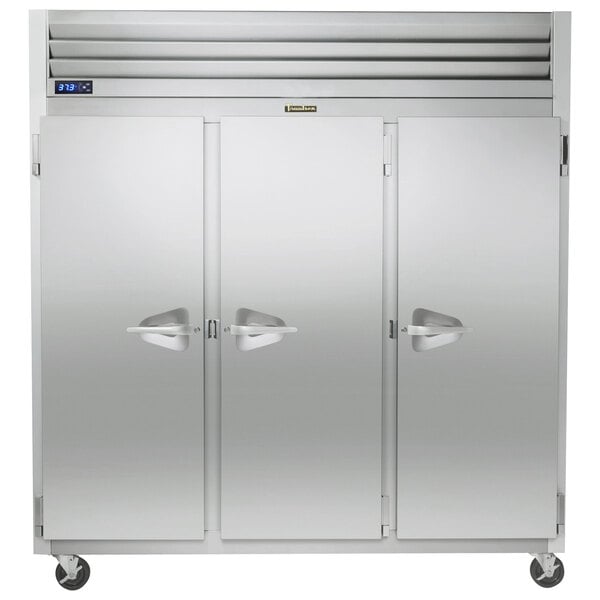 A Traulsen G Series reach-in freezer with three doors.