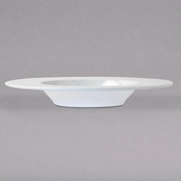 An Arcoroc white porcelain pasta bowl.
