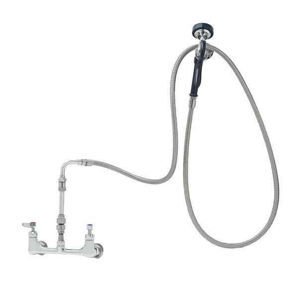 A T&amp;S wall mounted pet grooming faucet with hose attachment.