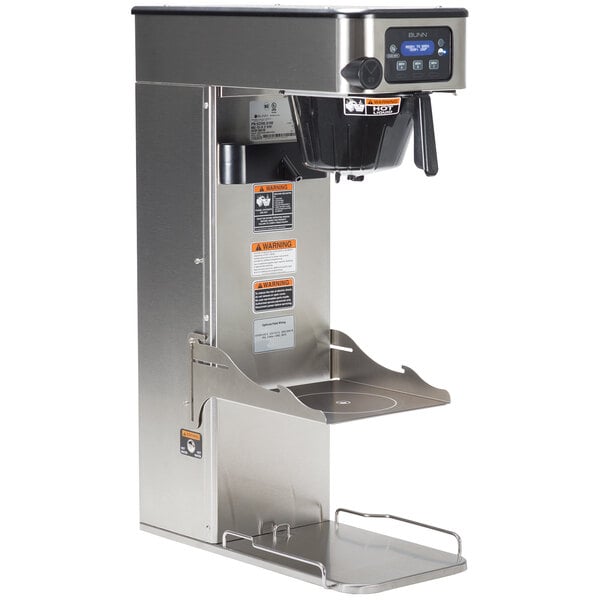 A silver Bunn ITCB-DV coffee and tea brewer on a stainless steel stand.