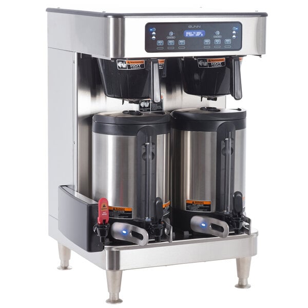 A Bunn commercial automatic coffee machine with two coffee containers on top.