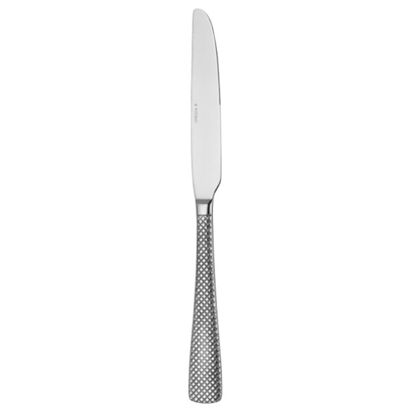 A Oneida stainless steel dinner knife with a textured silver handle.