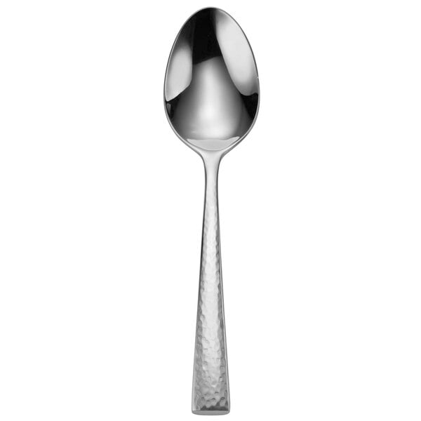 A Oneida stainless steel table spoon with a textured handle.