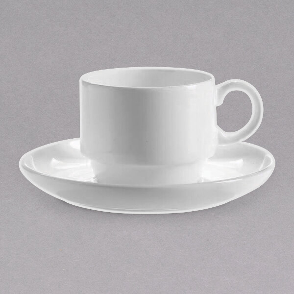 A close-up of a white Chef & Sommelier Infinity saucer with a white cup and saucer on a white surface.